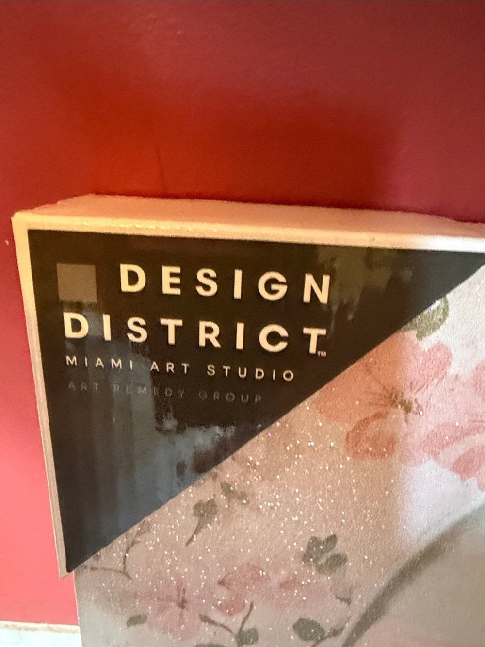 Design District Picture that Shows a Dog reading a Chanel book on the toilet